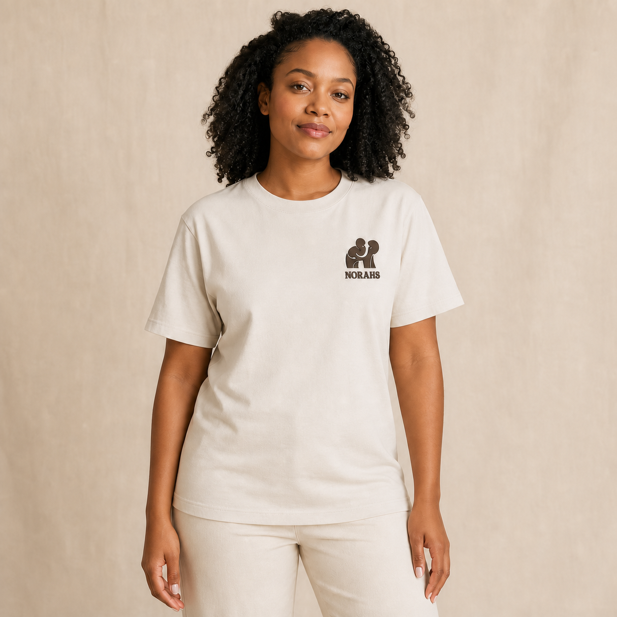 Middle Aged Woman wearing the natural Signature Supima Tee, front view