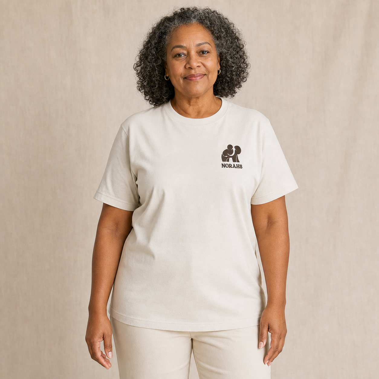 Older Woman wearing the natural Signature Supima Tee, front view
