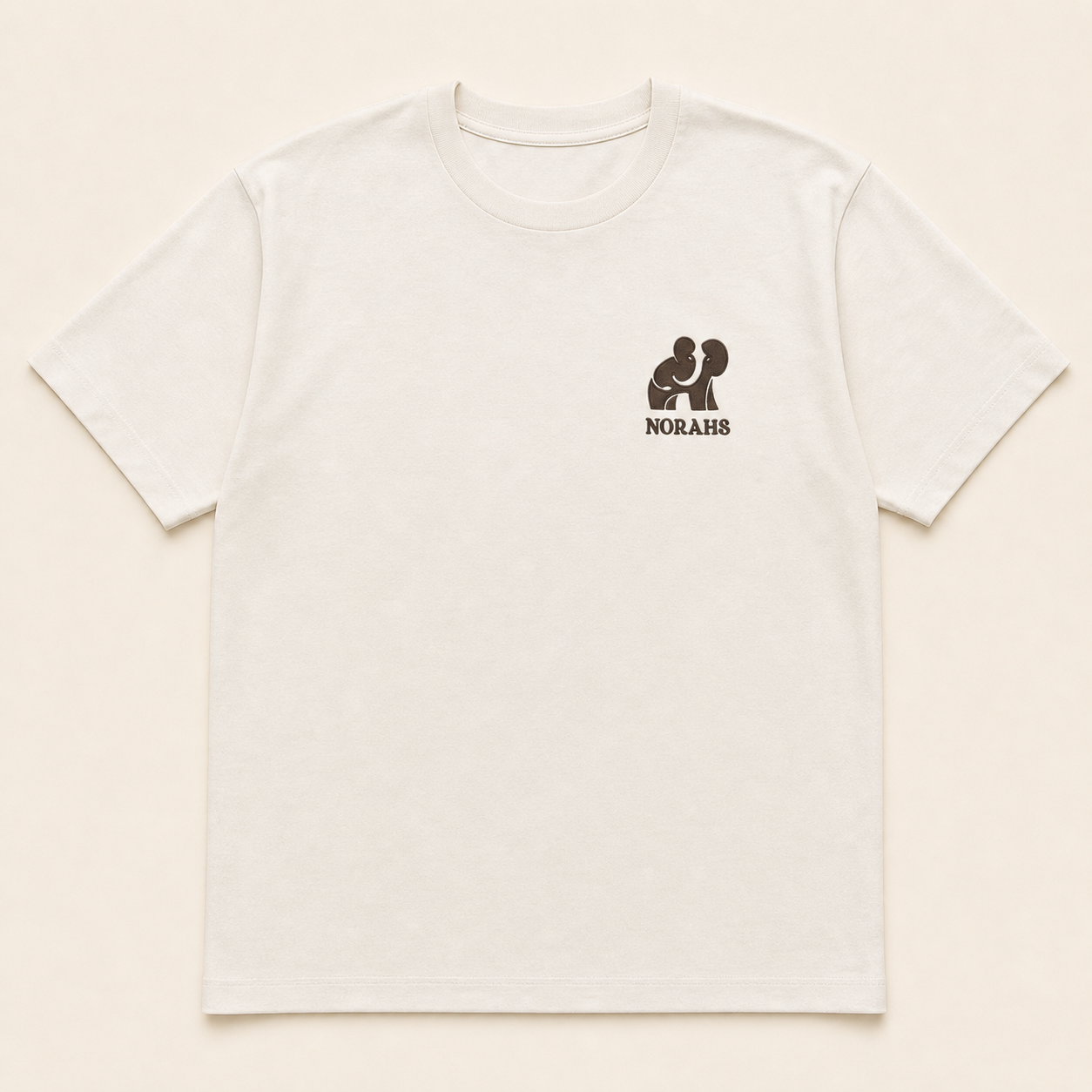 Norahs Signature Supima Tee in Natural with Brunette Brown embroidered emblem
